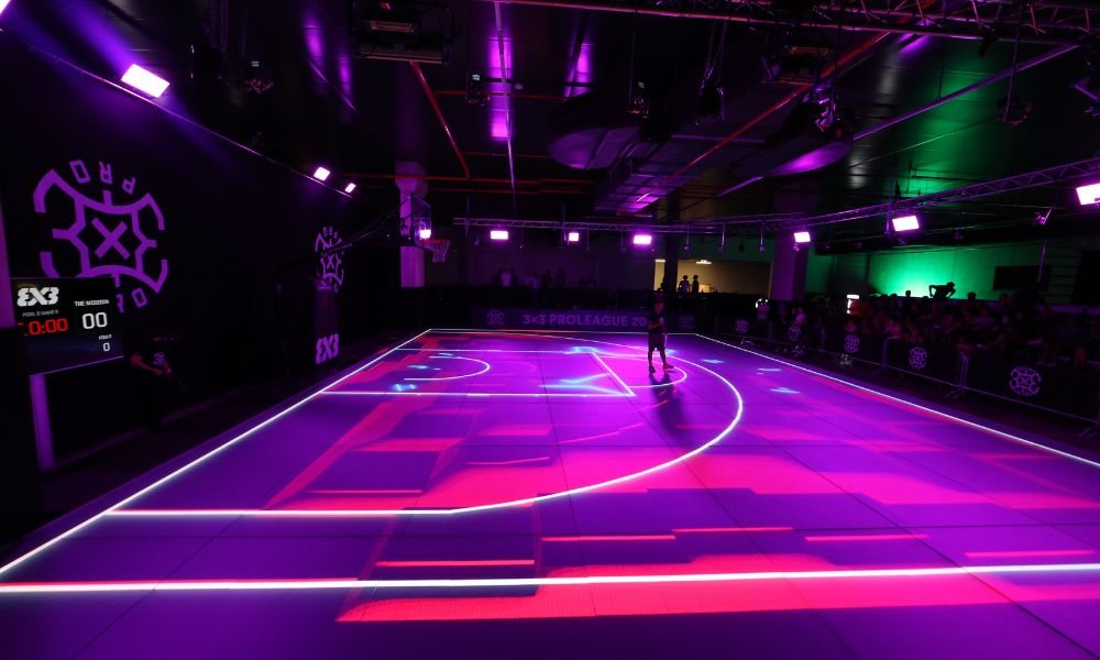 A glimpse of the LED Glass Flooring introduced by FIBA, via SportsPro Media